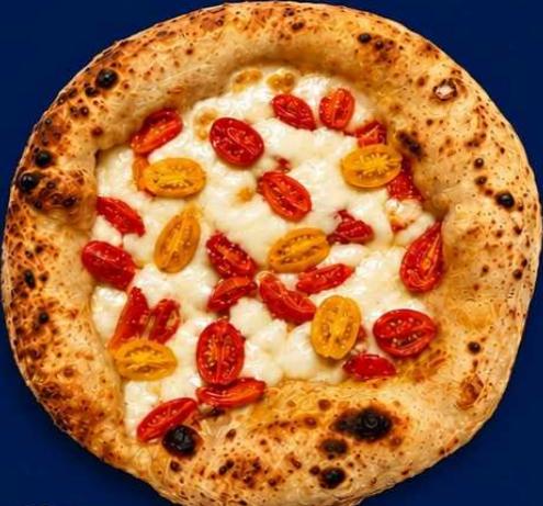 Italian pizza with two varieties of tomato